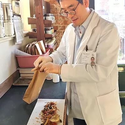 Chinese Herbs being portioned out